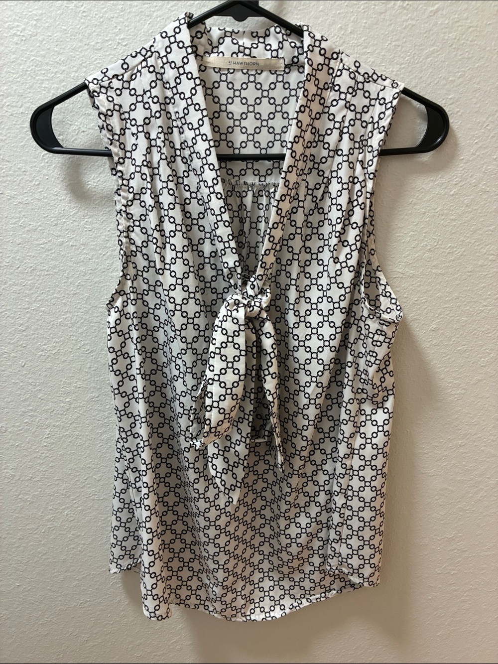 41 Hawthorn White and Black Sleeveless Tie-Neck Geo Print Blouse
